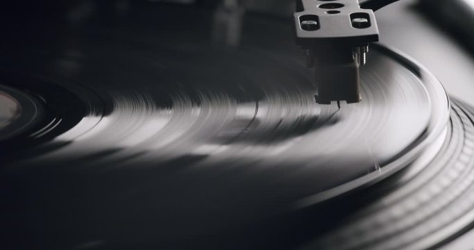 Tilt upwards to Vinyl Record Player with Needle