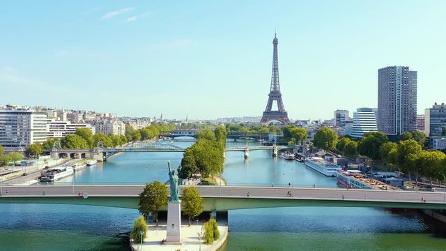 PARIS, FRANCE - MAY, 2019: Aerial drone view of Eiffel tower and Seine river in historical city centre from above.
