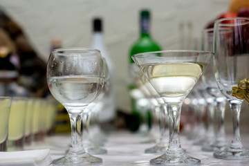 Different fresh alcoholic cocktail in glass on bar table, many colorful drinks. Party and holiday celebration concept