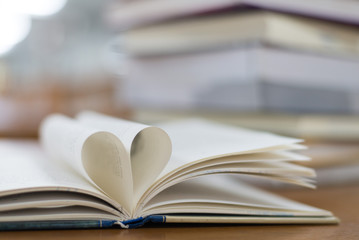 book on wooden table
