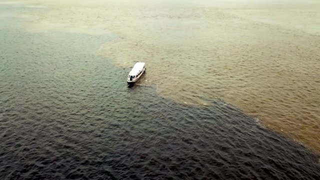meeting of waters Solim&otilde;es and Rio Negro - Encontro das &aacute;guas Amazonas