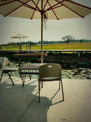 table and chairs on terrace coffee café