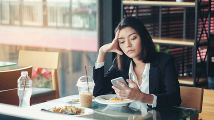 The woman was upset that her friend had defaulted and abandoned her while eating.