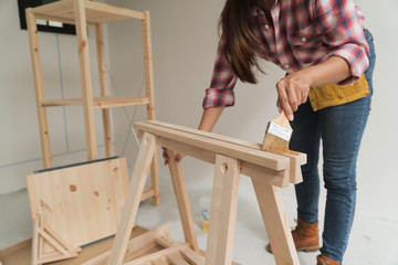 woman worker in the carpenter workroom.