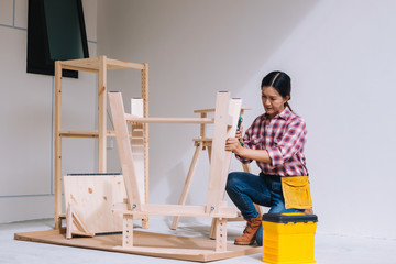 woman worker in the carpenter workroom.