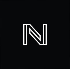 Minimal elegant monogram art logo. Outstanding professional trendy awesome artistic N NN initial based Alphabet icon logo. Premium Business logo White color on black background