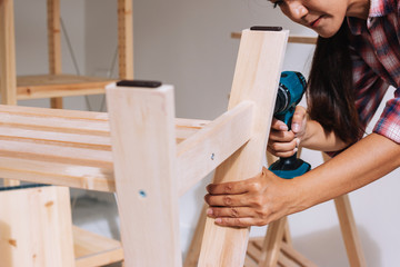 woman worker in the carpenter workroom.