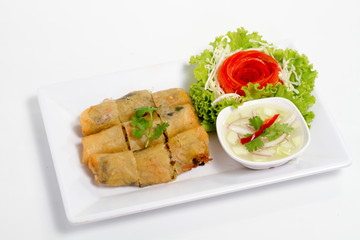 Thai food fried spring roll white dish isolated