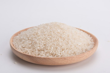 Granular rice on a white background