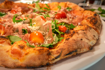 Close up parma ham pizza.