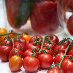 Cherry tomatoes on a store counter.