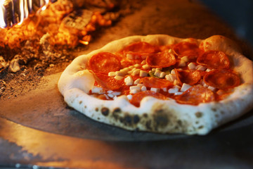 Neapolitan wood-fired pizza in  stove