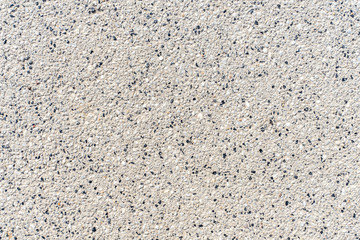 rough texture of interspersed stone. grunge background
