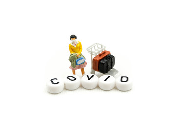 Miniature people : coronavirus covid 19 infected patient caution outbreak alert.