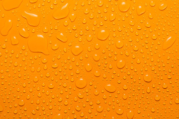 close-up water drop orange background
