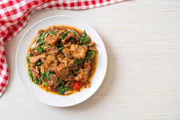 stir-fried crispy pork belly and basil