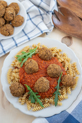 home made pasta with vegan meatballs on a plate