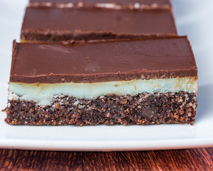 Slices of Peppermint Cacao & Coconut  on a white plate