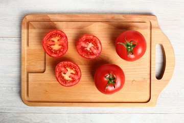 Tomatoes on cutting board