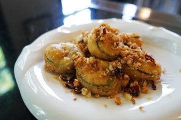 Close up deep fried eggplant with chili and garlic