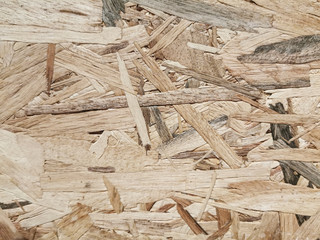 OSB oriented strand board surface texture. Background for wood and craft feeling.