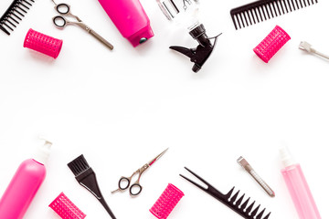 Beauty saloon accessories - combs, sciccors for hairdressing - on white background top-down frame copy space