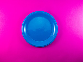 Blue plate Bright pink background