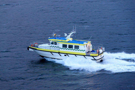 ROVDEFJORDEN, NORWAY - 2016 DECEMBER 05. Ambulance Boat In High Speed Ahead In The Fjord Of Norway.