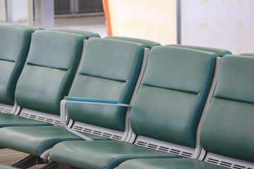 Empty leather seat for waiting to boarding at airport termial area zone.