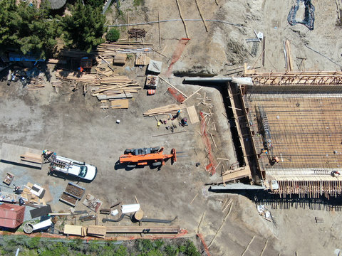 Aerial view of bridge construction crossing the highway, California, USA