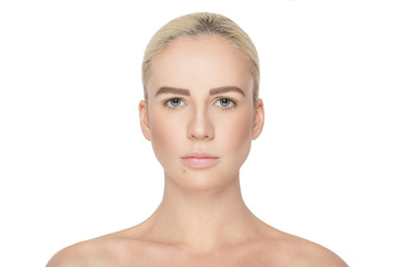 Beauty people portrait. Close-up portrait of a blonde girl with natural, fresh makeup in studio light, with naked shoulders, isolated on white background.