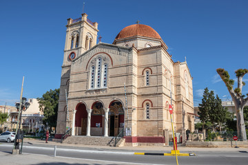 Fototapeta na wymiar The domed church of Panagitsa on the seafront at Aegina Town on the Greek island of Aegina.