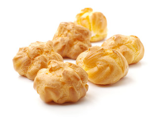 eclairs filled with fresh cream on white background