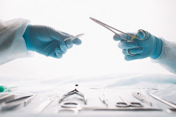 Medical Team Performing Surgical Operation in Modern Operating Room.