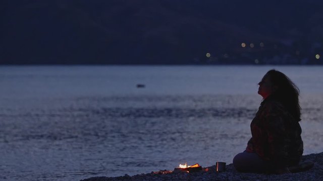 halted on the beach by the sea by the fire