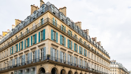 Fototapeta na wymiar Paris, typical facade and windows, beautiful building rue de Rivoli