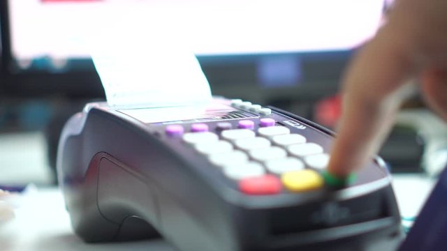 Credit card payment for purchase or sell products and service, business people hand pushing button or swipe to buy shopping through electronic transaction machine, Payments by credit card in terminal