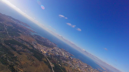 Expression. Skydiving makes people confident. Flying in the clouds.