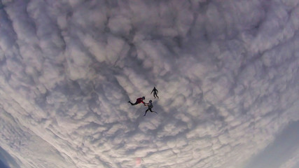 Expression. Skydiving makes people confident. Flying in the clouds.