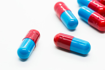 prescription pills on white background closeup
