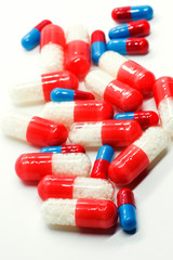 prescription pills on white background closeup