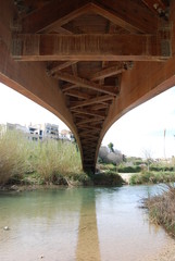 Curved Wooden Bridge over River Turia, Spain