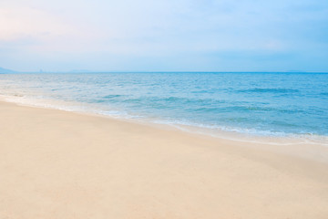 Fototapeta na wymiar Beautiful beach in summer, blue sea with white sand.