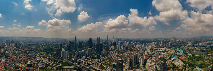 Naklejka na ściany i meble Aerial panorama cityscape view in the middle of Kuala Lumpur city center ,day time , Malaysia