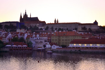 Evening landscape of the Vltava river and Prague Castle in Old Prague. Beautiful sunset.