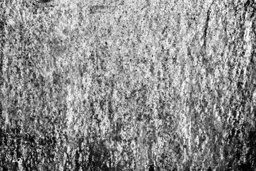 Texture of a concrete wall with cracks and scratches which can be used as a background