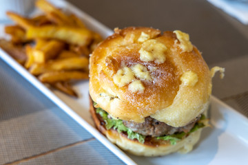 Ensalmada burger with fried sweet potato