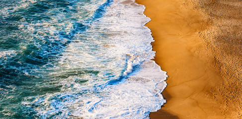 Praja do Northe, the wide bay of golden sands of Nazare, Portugal