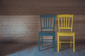 two chairs and on wooden floor and wall