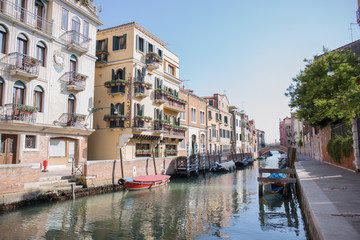 gondolas in venice near the pier